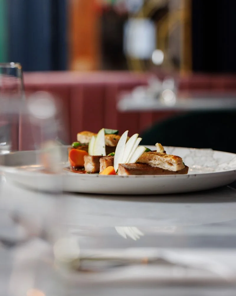 A selective focus shot of a starter dish artistically plated at a Temple Bar restaurant.